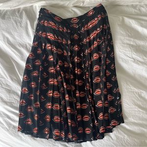 Prada Lip Print Knee-Length Pleated Skirt